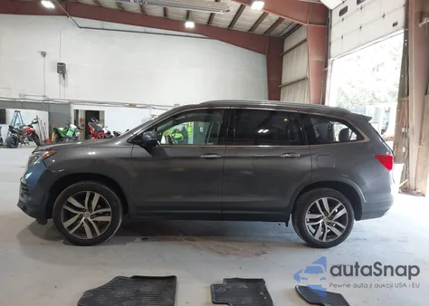 2017 Honda Pilot Elite z USA, uszkodzony, nr VIN 5FNYF6H09HB100801